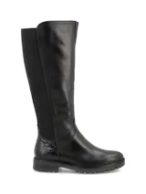 Bota de cuero negra con elásticos laterales, plantilla super-soft y base estilo track.
