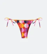 Bombacha de bikini estampada con lunares de colores, con lazos laterales ajustables.