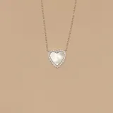 Conjunto de collar y dije de corazón en plata 925 y nácar, con borde de circonias.