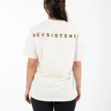 Remera color crudo de algodón con estampado serigráfico en la espalda con la palabra 'PERSISTENCE'.