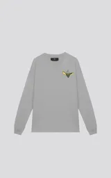 Remera gris de manga larga con cuello redondo y estampado pequeño de Gremlins en el pecho.