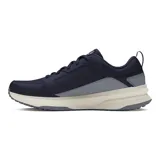 Championes Under Armour Charged Edge para hombre, color negro con detalles en verde flúor y suela blanca. Ideales para entrenamiento en gimnasio o al aire libre.