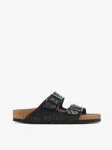 Sandalias Birkenstock modelo Arizona, color negro con estampado de cebra.