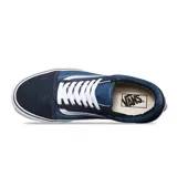 Championes de lona de color azul con detalles en blanco, diseño clásico de Vans.