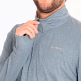 Buzo gris de poliéster reciclado y spandex, con cuello alto y cierre de cremallera hasta el pecho. Tiene mangas largas con orificios para los pulgares y logo de la marca en el pecho.