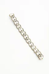 Vincha elástica bordada con piedras facetadas y strass.