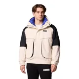 Campera Columbia Powderkeg II Inter color crema con mangas negras y cuello azul. Cuenta con tecnología Omni-Tech™ impermeable y transpirable, sistema de intercambio con cremallera, forro reversible con aislamiento sintético, cierre frontal con solapa, cremallera frontal de doble sentido, bolsillos interiores y exteriores con cremallera, y puños ajustables.