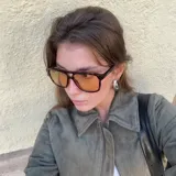 Gafas de sol con montura aviador carey y lentes amarillas.