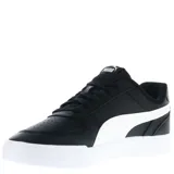 Championes urbanos Puma Caven, color negro con detalles en blanco, confeccionados en cuero sintético, con logo de Puma en los laterales y suela de goma.