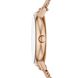 Reloj Skagen con caja redonda de acero color oro rosa, dial azul y malla milanesa dorada.