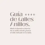Anillo de plata 925 con diseño de doble banda cruzada.