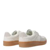 Zapatillas deportivas negras con detalles en blanco y suela color caramelo.