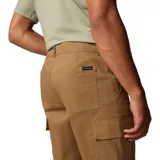 Pantalón cargo color marrón, de corte recto, con bolsillos laterales con cierre de velcro y bolsillos traseros. Confeccionado en tejido elástico. Marca Columbia.