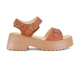 Sandalias marrones con plataforma, tiras anchas con hebillas y suela track.