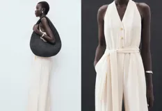 Mono largo color crudo, con escote halter, sin mangas, con cierre de botones frontal y cinturón tipo lazo en la cintura.