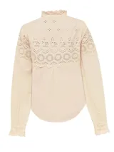Blusa beige de algodón orgánico con cuello alto y detalles de broderie en la parte superior.