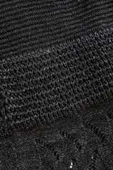 Falda larga de tejido de punto calado color negro, con lurex y detalle de cobre con logo Polonio.