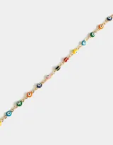Collar corto con cadena dorada y dijes de ojos turcos de colores.