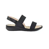Sandalias bajas negras con dos tiras elásticas sobre el empeine y ajuste con velcro en el tobillo.