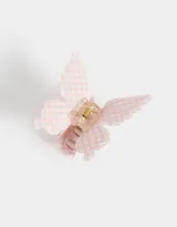 Broche para el pelo con forma de mariposa a cuadros rosas y blancos.