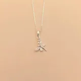 Conjunto de collar y dije de libélula en plata 925 con circonias.