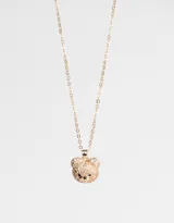 Cadena dorada con dije de oso cubierto de strass.