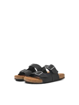 Sandalias Jack & Jones de cuero color negro, con dos tiras ajustables con hebilla y suela de corcho.