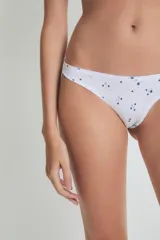 Colaless blanca con estampado de flores azules.