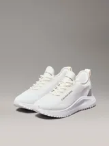 Zapatillas Calvin Klein Jeans modelo Eva Runner, color blanco. Confeccionadas con materiales reciclados, capellada de malla y suela de EVA ultraligera.