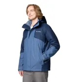 Campera Columbia 3 en 1 color azul marino, con capa exterior impermeable y transpirable, tecnología termorreflectante Omni-Heat™ y forro polar interior. Capucha desmontable y ajustable, puños y dobladillo ajustables, bolsillos con cremallera y protector de barbilla.
