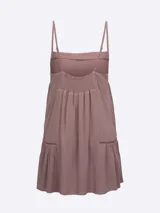 Vestido corto blanco de viscosa con breteles finos y corte imperio.