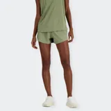 Shorts de running para mujer, color verde claro, con forro interior y cordón ajustable. Presenta detalles reflectantes y bolsillos con cierre.