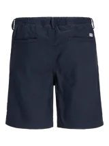 Short chino azul marino de lino y algodón, corte relajado, cintura media con elástico y cordón ajustable, bolsillos frontales y traseros.