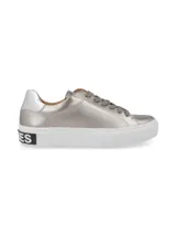 Zapatillas Hush Puppies color beige con cordones y suela blanca.