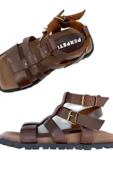 Sandalias de cuero color marrón chocolate, con múltiples tiras horizontales y ajuste con hebillas.