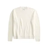 Suéter de punto color crema con cuello redondo y mangas largas.