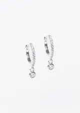 Par de aros de plata 925 con forma de argolla, decorados con pequeñas circonias y dije colgante de zirconia estilo punto de luz.