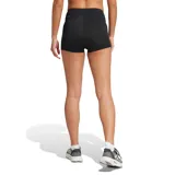 Short deportivo negro de tiro alto con logo de Adidas en la pierna izquierda.