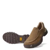 Zapatos casuales tipo mocasín Caterpillar Threshold, color marrón claro (beige natural), confeccionados en lona (canvas) con puntera y suela de goma marrón oscuro. Diseño sin cordones con elástico lateral para ajuste.
