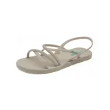 Sandalias Ipanema color beige con tiras finas cruzadas y una tira con diseño trenzado.