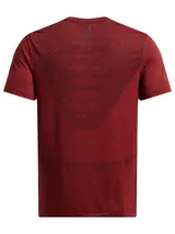 Remera deportiva gris jaspeado de corte clásico, con cuello redondo y mangas cortas. Confeccionada con tejido de punto transpirable y tecnología seamless para mayor comodidad.