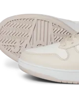 Championes urbanos Jack & Jones modelo Jam, color crema con detalles en blanco. Confeccionados en malla de poliéster y poliuretano, con suela de goma y puntera redonda.