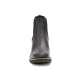 Botín Chelsea de cuero negro con elástico lateral, suela de goma con plataforma y taco cuadrado.