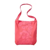 Toalla de playa Rip Curl Waikiki Revo con estampado de flores de hibisco en tonos de rosa.