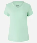 Blusa blanca de algodón con cuello en V, manga corta y bolsillo frontal.