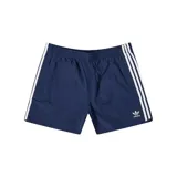 Shorts de baño o deportivos Adidas Originals Adicolor Classics Sprinter, color azul marino, con cintura elástica y cordón ajustable. Presenta las tres franjas blancas características a lo largo de los costados y el logo del trébol bordado en blanco en la pierna izquierda.