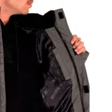 Campera puffer amarilla con cuello alto y parte superior en pana negra. Tiene cierre frontal con velcro, bolsillos laterales con cierre y puños ajustables.