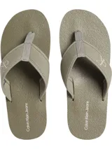 Ojotas Calvin Klein Jeans color verde oliva con base texturizada y tiras de lona con logo CK.