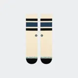 Medias Stance color crema con rayas horizontales marrones y naranjas.