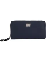 Billetera Tommy Jeans azul marino con cierre de cremallera y logo metálico en la parte delantera. Cuenta con tres compartimentos principales, dos compartimentos interiores para billetes, un bolsillo interior con cremallera y múltiples ranuras interiores para tarjetas.